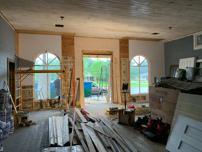 When Roddy and Cinnater bought the building, the ceilings and floors were covered in tiles. As part of the renovation process, they stripped the tiles in order to showcase the original wood underneath.