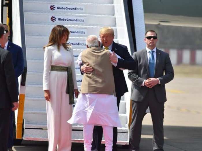 Prime Minister Narendra Modi greeted and hugged Donald Trump as they landed at the airport. He also shook hands with first lady Melania Trump.