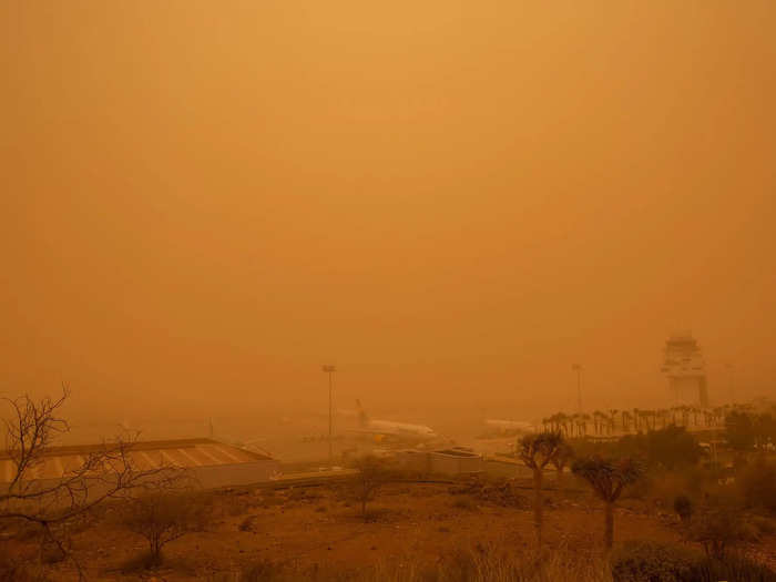 Here, a plane can be faintly made out during the sandstorm.