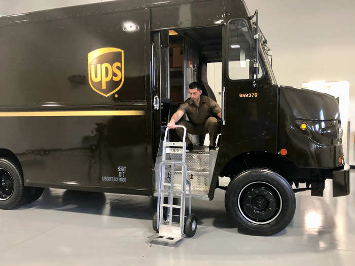 Later, students get hands-on training in a nearby room where four UPS trucks are parked.