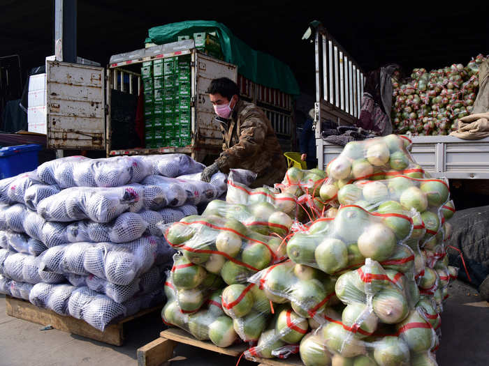 Grocery deliveries have surged in China as people fear the coronavirus, with as many as 80% of customers requesting contactless deliveries.