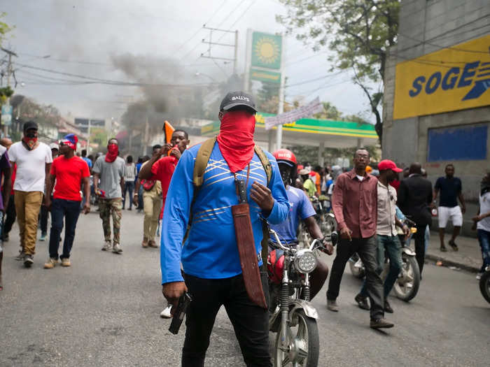 As armed, plain-clothed officers, and their supporters took to the streets, they shouted, "No money for police officers but enough money for carnival."