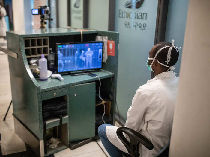 Passengers are screened in this picture in Addis Ababa, Ethiopia, for signs of coronavirus. Africa has only one confirmed case so far, but Bill Gates and others have warned that it could hit Africa even more severely than China.