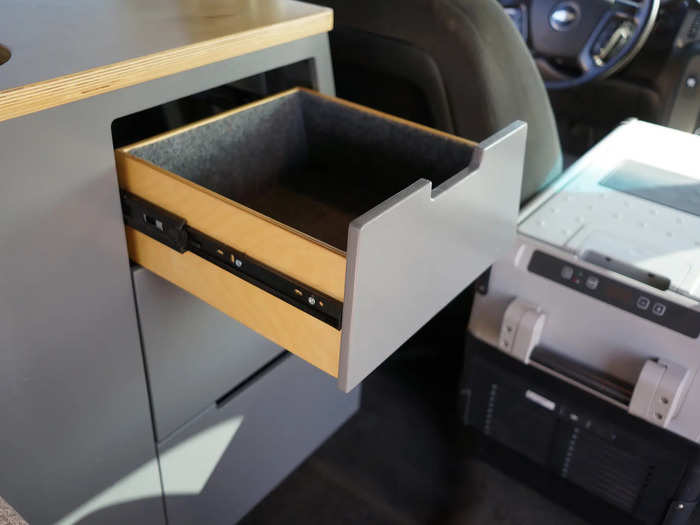 Onufer wanted to decrease the number of unnecessary and moving parts in the space. For example, the storage drawers don