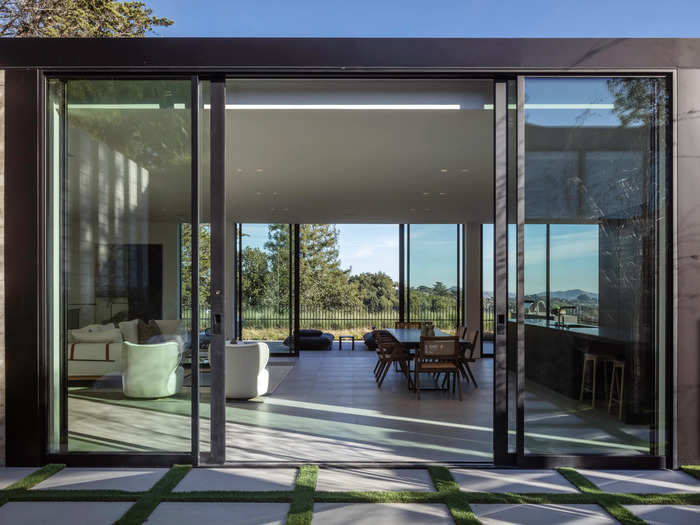 The living room on the first level acts as a "lens" to take in the landscape and bay.