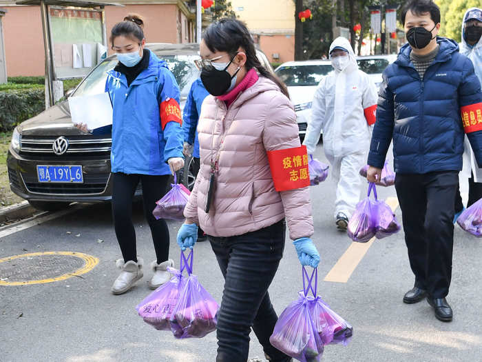 Employees of e-commerce companies like JD.com and Alibaba Group have been given protective gear including masks, goggles, and disinfectant.