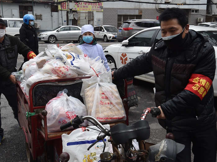 Some delivery personnel check residents