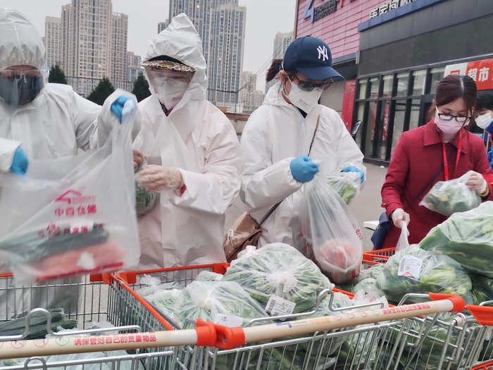 Truck-loads of food have been brought into Wuhan, as people remain in lockdown.