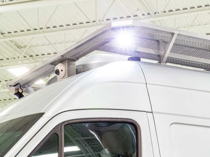 For extra security, there are multiple security cameras and LED lights mounted around the roof rack.