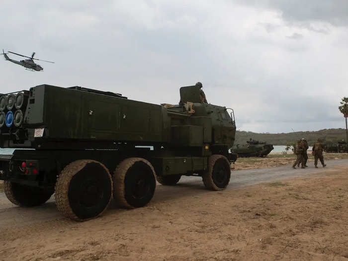 Disembarking by landing craft air cushion, or LCAC, the M-142 High Mobility Artillery Rocket System, or HIMARS, pushed through the beach landing site, another first for the exercise, after designated zones were cleared by the Thai-US force.