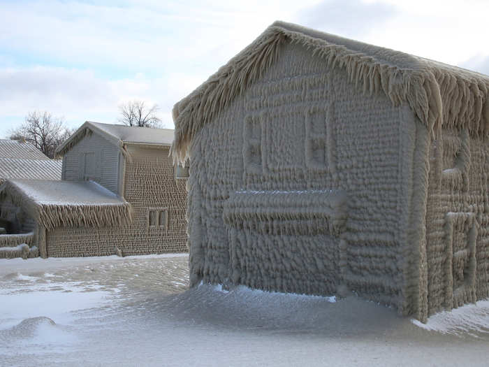 By Friday morning, lakefront properties were coated in sheets of ice and adorned with icicles.