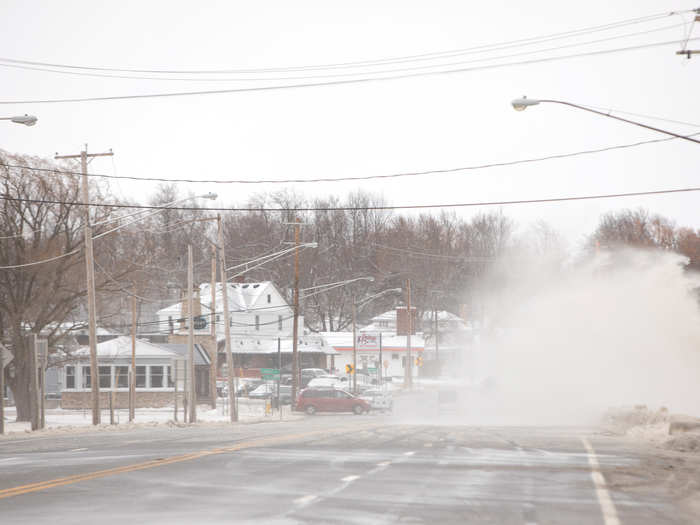 Starting on Wednesday, high winds struck the neighborhood, causing waves to crash over roads.