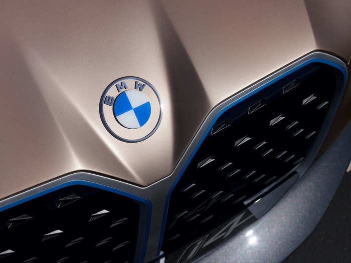 Not to mention, BMW is debuting a new logo with the i4 concept. The redesigned badge has a transparent outer ring.