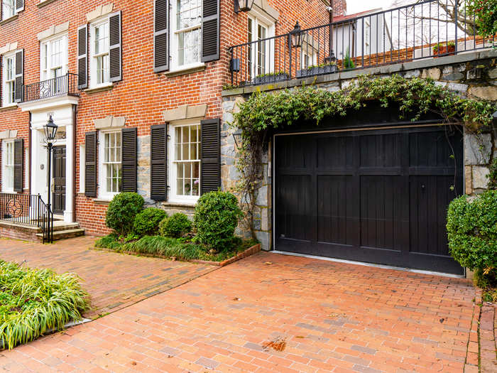 An attached garage offers ample storage space.