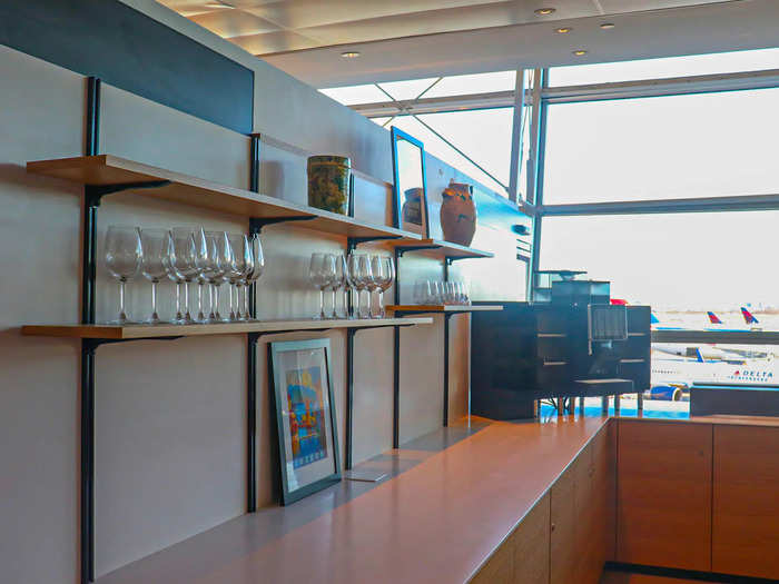 The dining section will feature premium wine, spirit, and beer selections, as well as a self-serve coffee machine also found throughout the lounge.