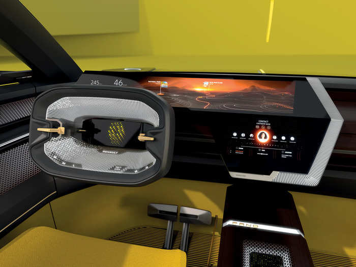 The inside of the Morphoz is home to plenty of other concept-car quirks, such as a screen right in the center of the steering wheel, and a larger dashboard display that folds away when it