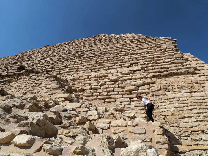 Tourists also climbed the staggered sides of the pyramid.