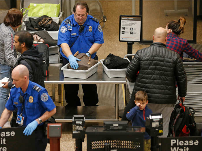 Storing items in my bag at the security checkpoint and using as few bins as possible.