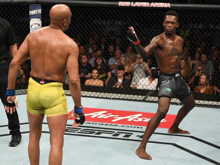 8: Israel Adesanya — 18 wins (14 KOs and 4 decisions), unbeaten.