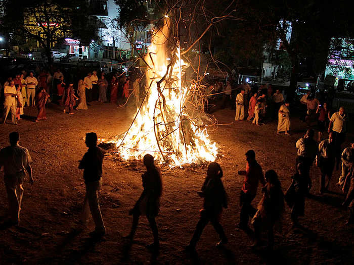 In observance of Holika Dahan, communities light bonfires to recreate the victory of Lord Vishnu, a Hindu God, over the demoness Holika. Holika attempted to lead one of Vishnu