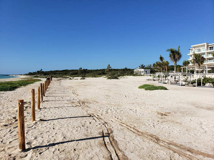 Palmaïa - The House of AïA is incredibly private. The resort has its own sprawling beach. Wooden markers separate the property line from the public beach.