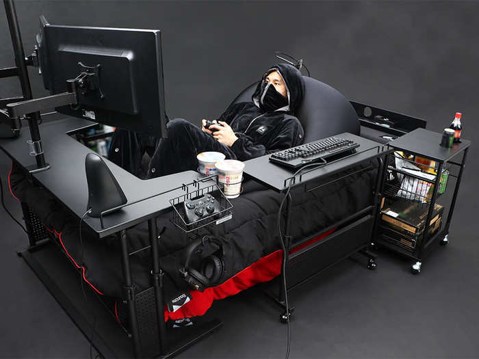 All of the accessories for the concept cost about $1,200 total from Bauhutte, not including the bed itself. That price does, however, include the "gaming blanket" seen in the photo.