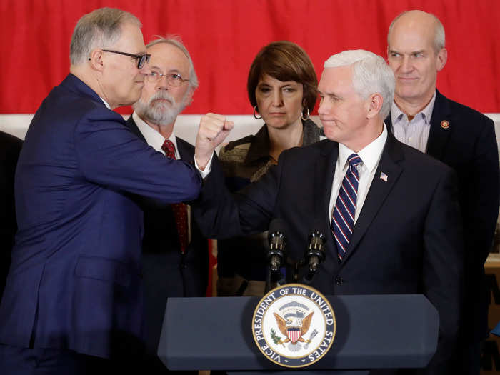 Trump has refused to stop shaking hands, even as Vice President Mike Pence, who is leading the government