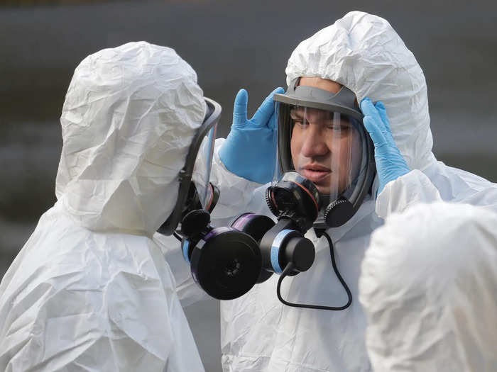 The disaster recovery team was kitted up in protective suits and respirators.