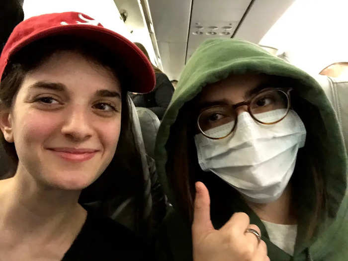 By the end of the flight, I felt calm enough to take my mask off. My sister was a bit more cautious.