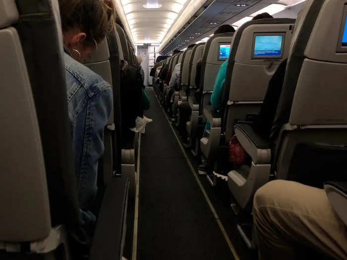 I was surprised at how full the plane was. Though there were a few empty seats, the plane was almost entirely filled with passengers.