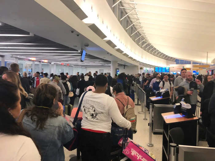 I waited in a slow-moving security line for about 25 minutes. I noticed a lot of people around me wearing masks and gloves.