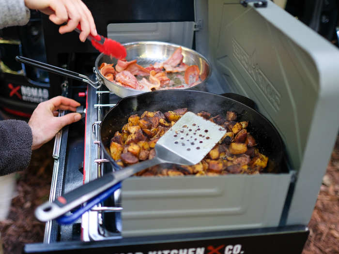 Optional add-ons include water tanks and the stovetop that can fit in the stovetop area.