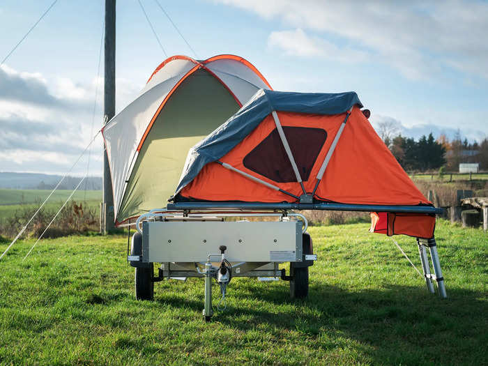 The roof tent pulls out over the cargo area.