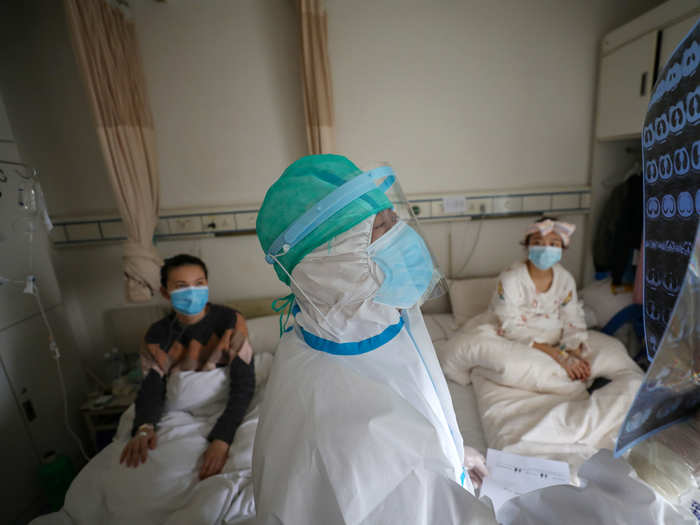 China walled off entire hospital wards to contain the virus.