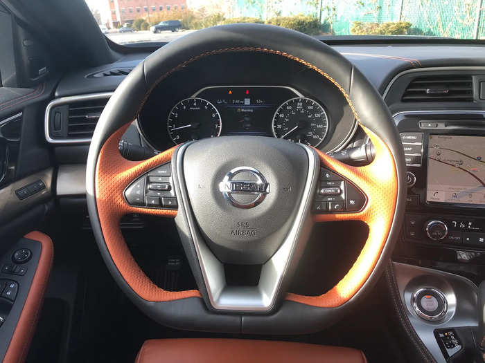 The flat-ish bottom and the sporting nature of the leather-wrapped, two-tone steering wheel encourages spirited motoring. (Nissan calls is "D-shaped.")