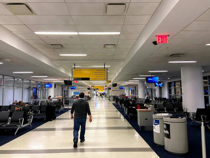 When we got to our gate, there were only a few people waiting for our flight, which is typically packed. Most times when I take this flight, it