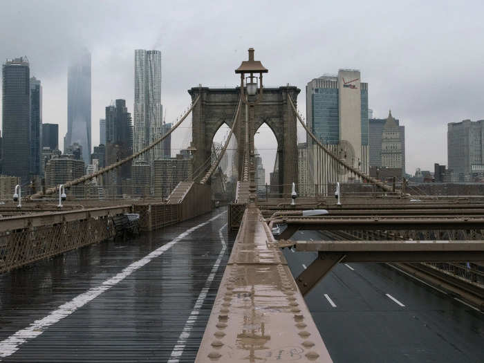 An empty Brooklyn Bridge is seen during the outbreak of coronavirus disease (COVID-19), in New York City, New York, U.S., March 17, 2020.