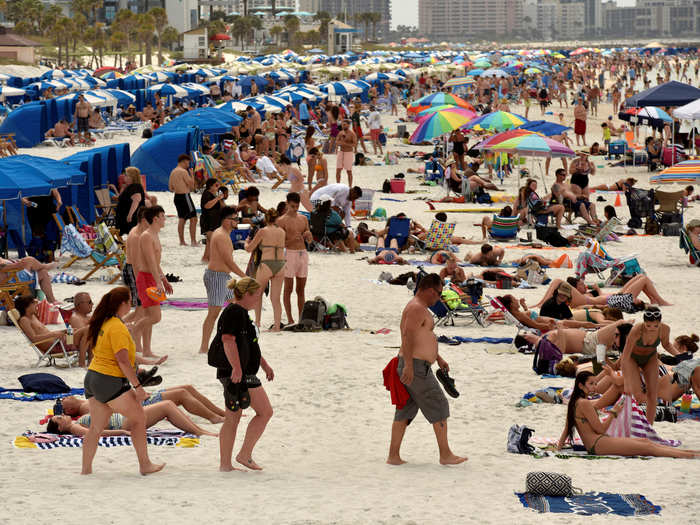 And a video on Twitter from Monday showed beaches in Clearwater, Florida, packed with spring breakers. It promptly sparked a lot of backlash.