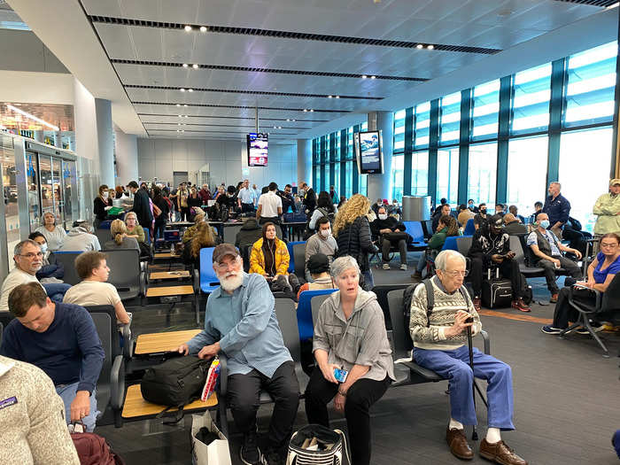 The gate area was packed — this flight seemed completely full, mixed with people who were scheduled to travel already and hadn