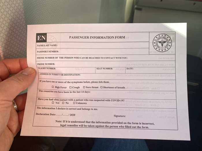 Then the flight attendants passed out health screening forms from the Turkish government. We filled them out, but since we didn