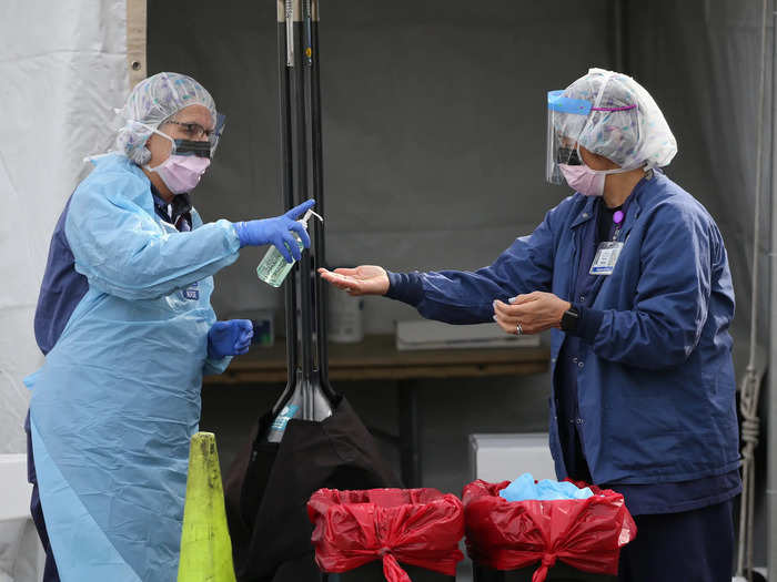 Workers take extra care to disinfect before and after administering tests to limit the spread of the disease.