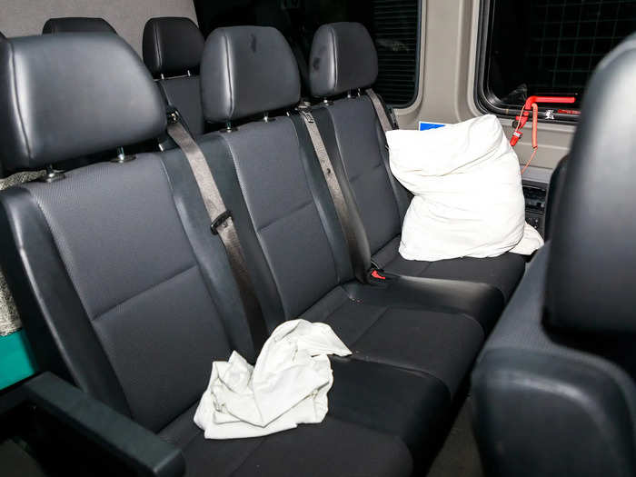 The inside of their Sprinter has the bare essentials needed for comfort: blankets, pillows, and snacks that help them stay at ease throughout hundreds of miles of driving.