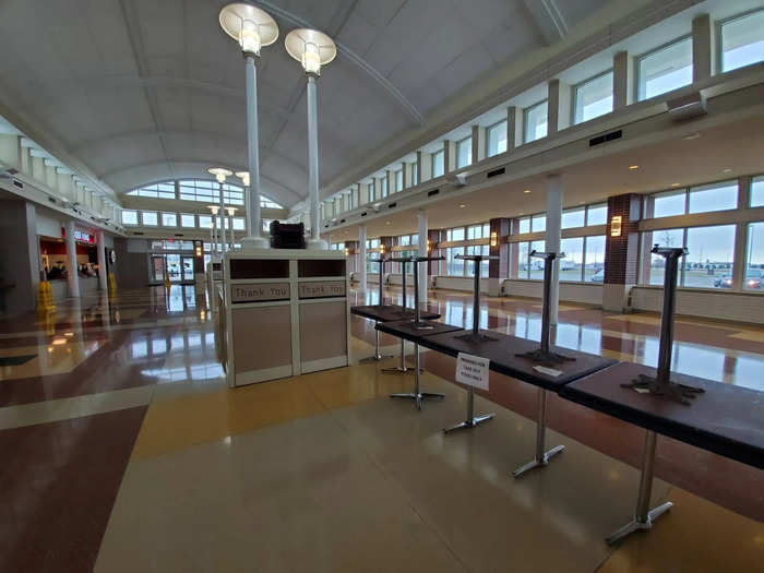 This seating area was barricaded with tables, and a sign told visitors: "premises for take-out food only."