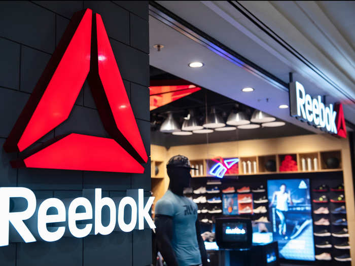 Reebok, a subsidiary of Adidas, is also closing stores and paying workers for lost shifts.