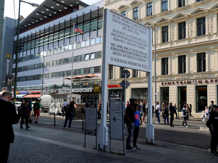 BEFORE: Checkpoint Charlie, the best-known former crossing point between East Berlin and West Berlin, attracts around 850,000 visitors a year by itself.