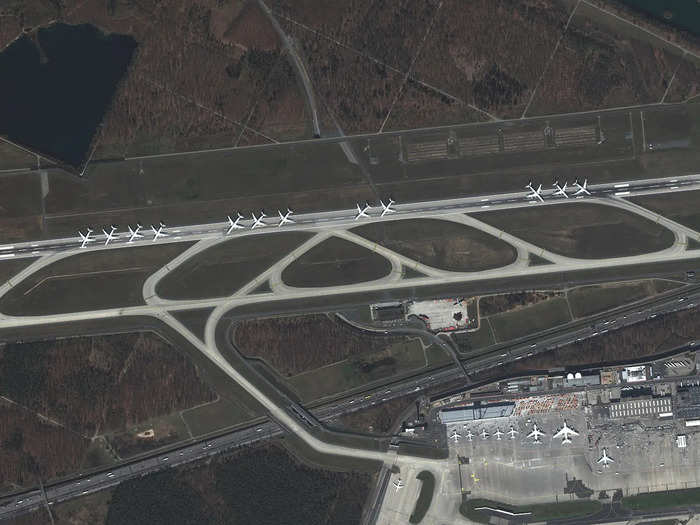 Grounded planes are parked over on runway 07L/25R, the airport