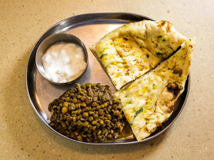 I had some naan in the freezer, so I used that. But any crusty or flatter bread will do. You can also serve with a dollop of yogurt if you have it (an Indian-inspired addition, not Mama Aisha