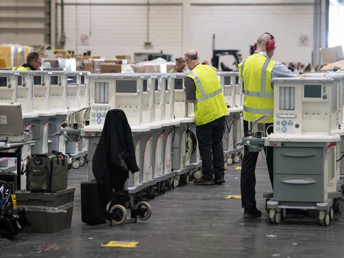 Staff were also seen bringing in multiple respirators — vital medical devices used to help the worst-affected patients breathe as the coronavirus damages their lungs.