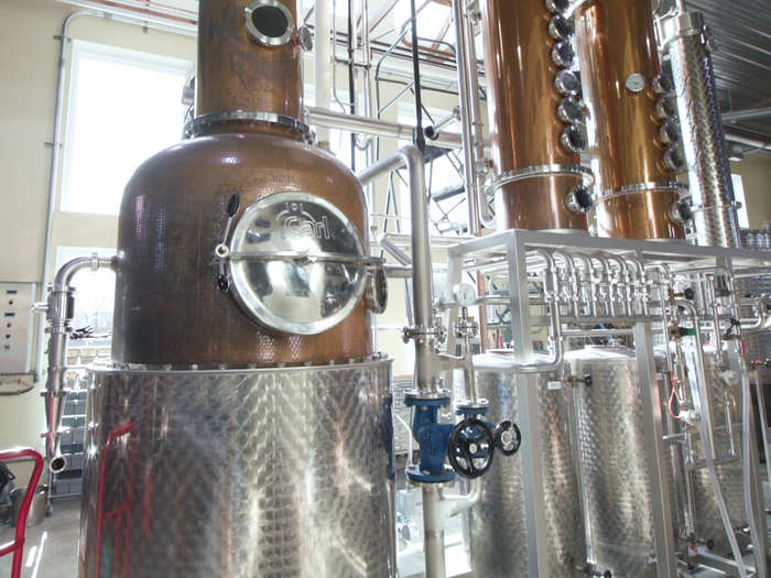 The grain is then milled and fermented over the course of a few days. The fermented grain is run through a distillation set until it reaches a high-proof alcohol.