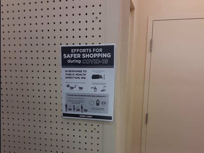 Hobby Lobby posted signs on the wall that claim it is enhancing cleaning procedures and equipping employees with hand sanitizer.